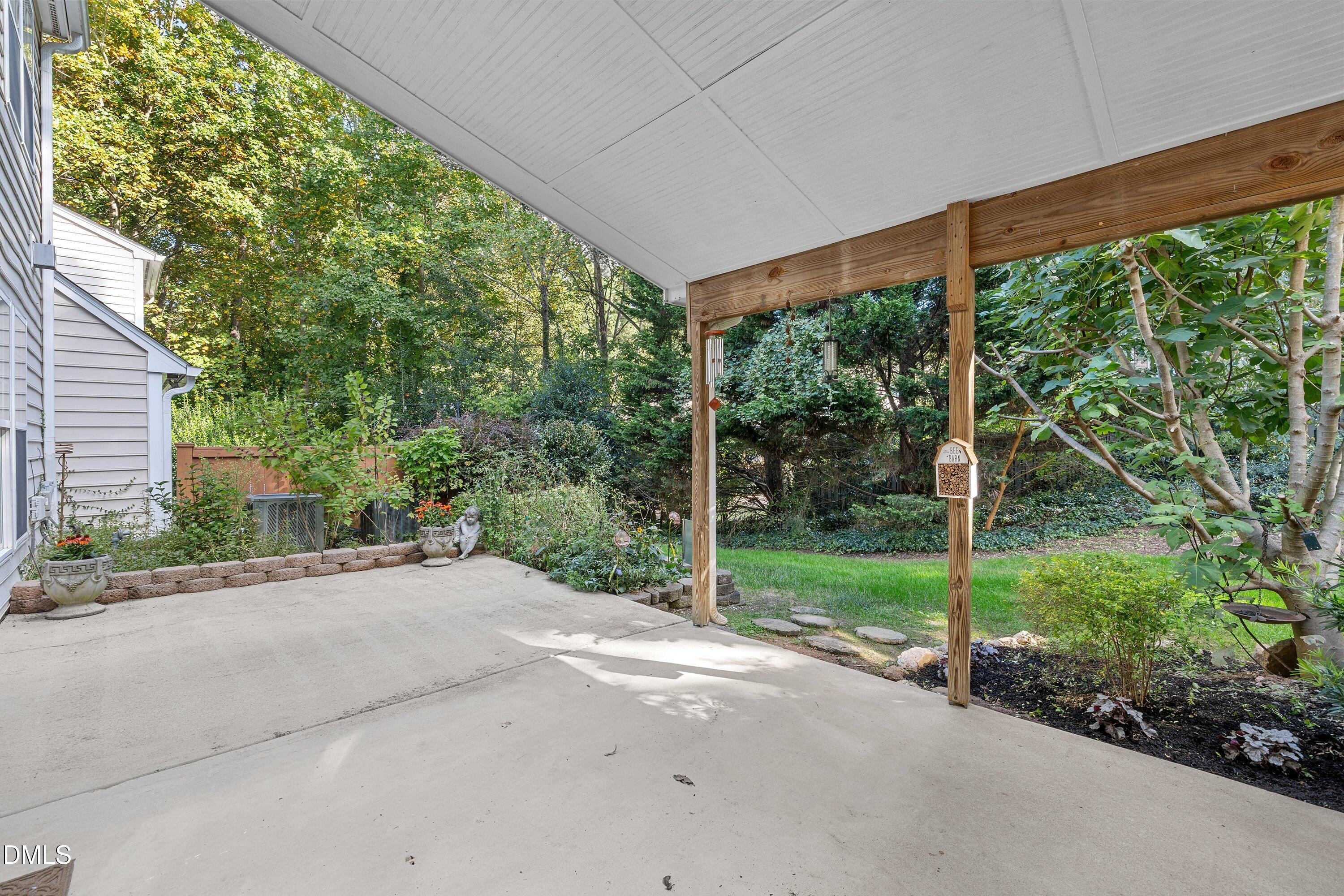 3613 Lion Ridge Court Raleigh, NC 27612 - Photo 36 of 40 a view of a garden with pathway