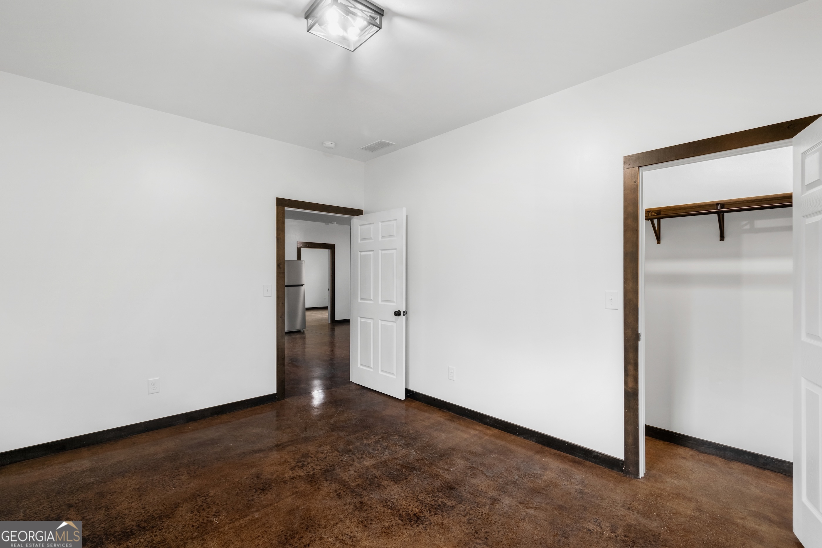 620 Stiles Road, Unit A Epworth, GA 30541 - Photo 13 of 21 a view of an empty room with a window