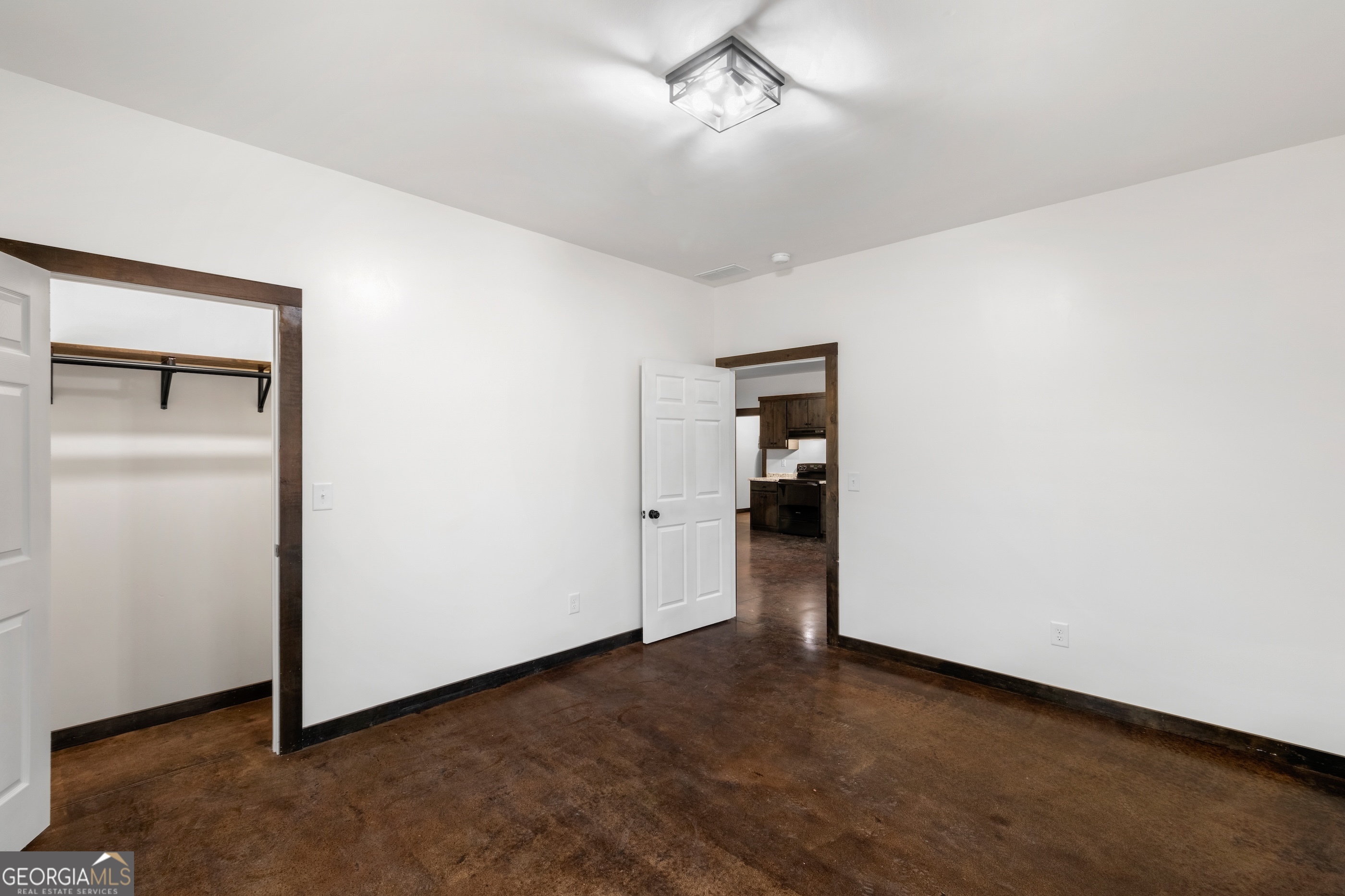 620 Stiles Road, Unit A Epworth, GA 30541 - Photo 16 of 21 a view of a room with a hallway and stairs