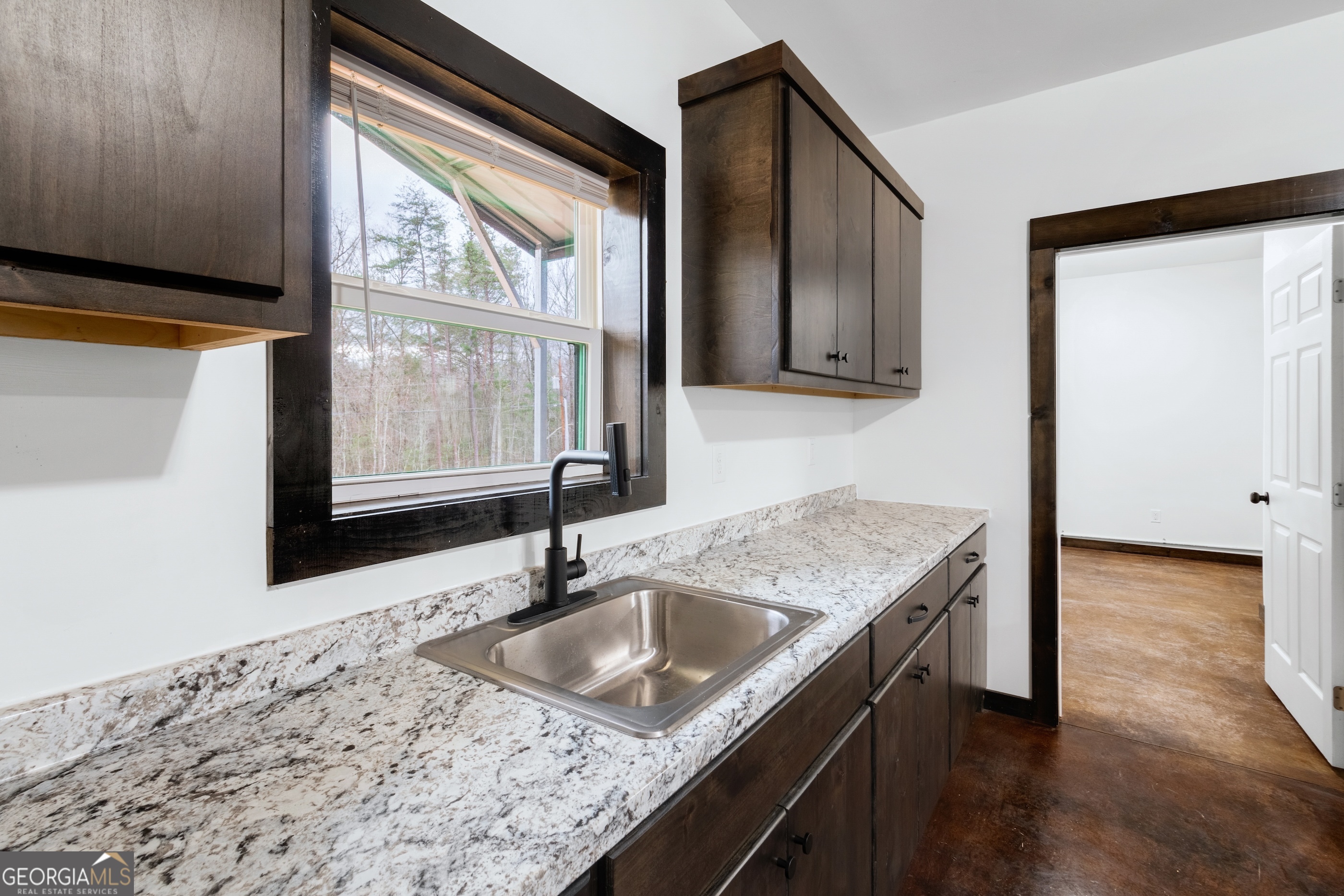 620 Stiles Road, Unit A Epworth, GA 30541 - Photo 6 of 21 a bathroom with a granite countertop sink and a window