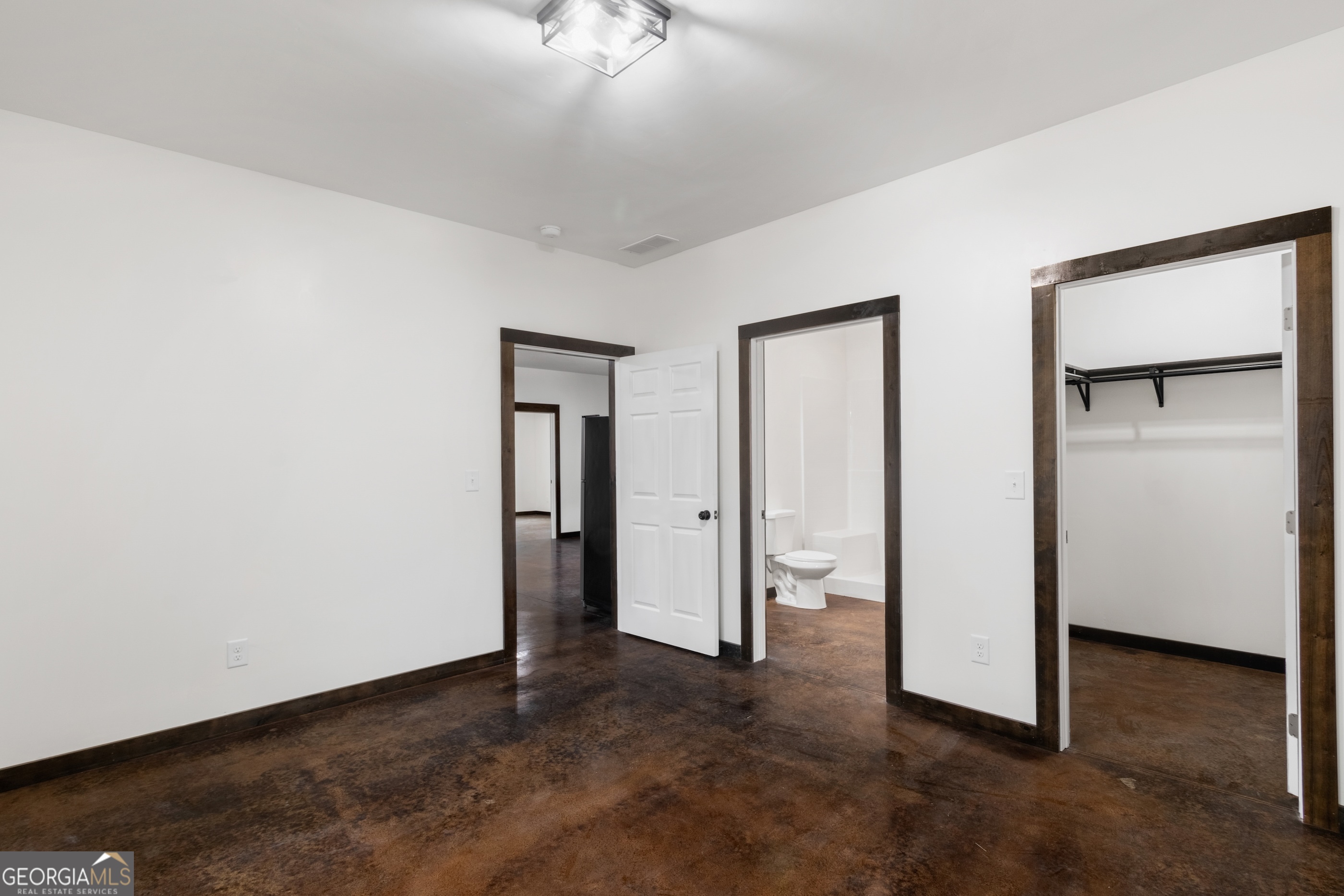 620 Stiles Road, Unit A Epworth, GA 30541 - Photo 8 of 21 an empty room with closet area