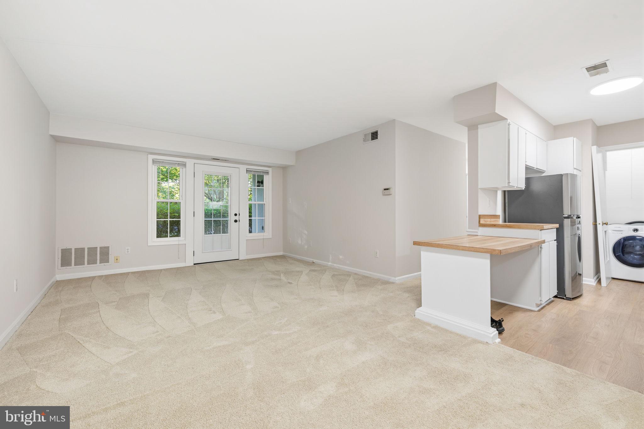 5817 Rexford Drive, Unit 798 Springfield, VA 22152 - Photo 5 of 23 a view of a kitchen with a sink