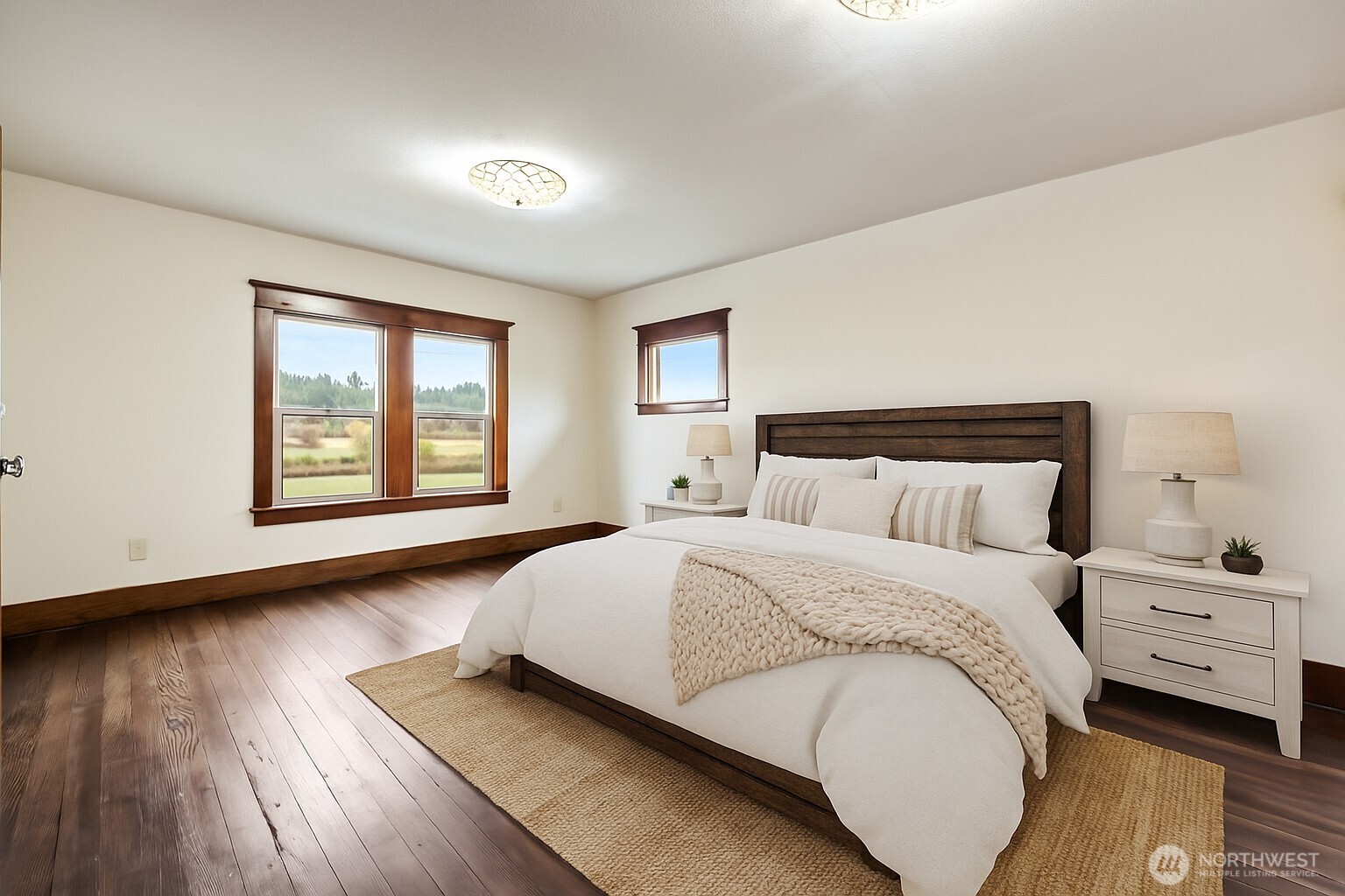 1604 Lincoln Creek Road Rochester, WA 98579 - Photo 27 of 40 a spacious bedroom with a bed and a window