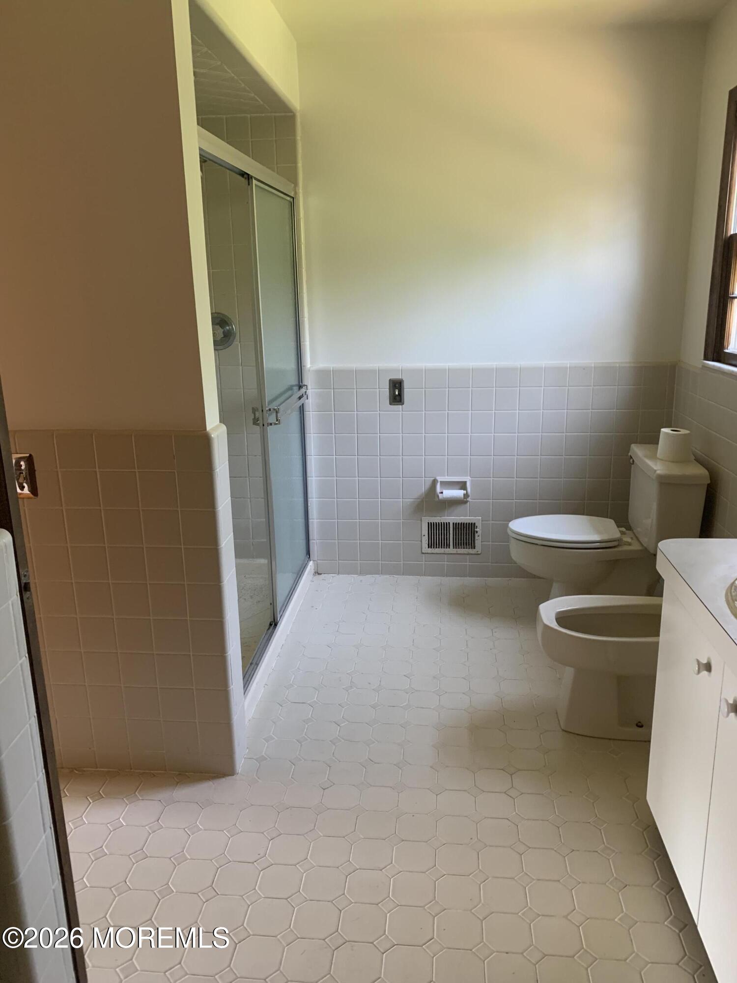 2 Carbury Road Asbury Park, NJ 07712 - Photo 20 of 21 a bathroom with a sink and a toilet