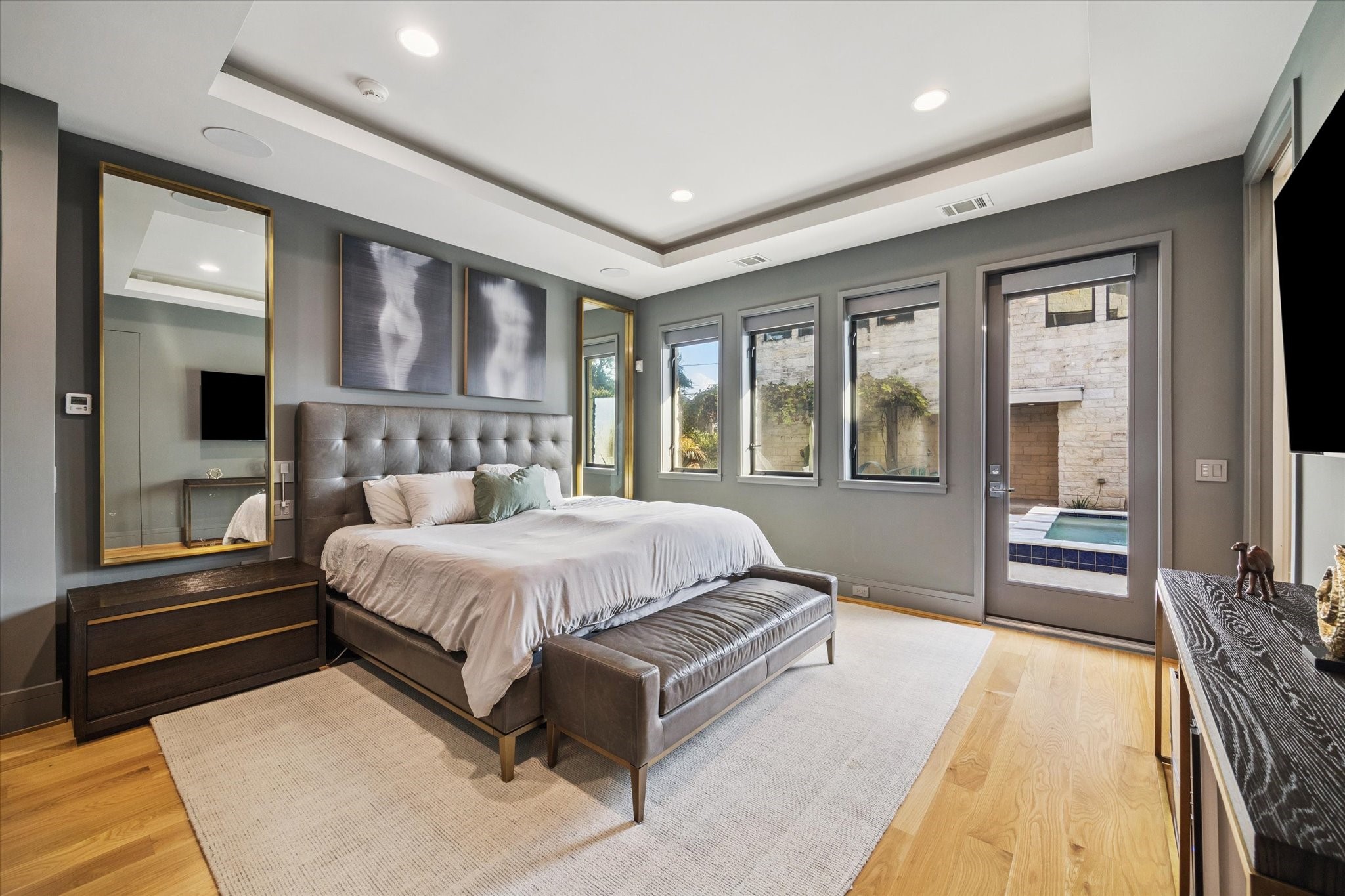 1249 Chippendale Road Houston, TX 77018 - Photo 15 of 45 Primary suite with automatic shutters, led accent lights in tray ceiling and built in reading lights.