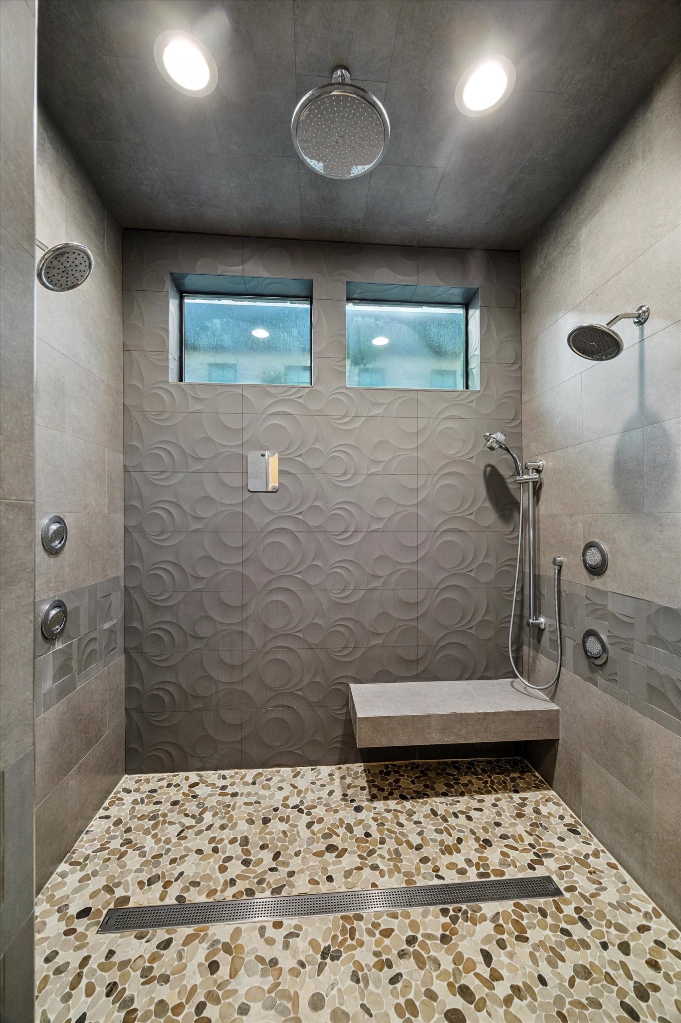 1249 Chippendale Road Houston, TX 77018 - Photo 19 of 45 A shower to brag about! Featuring two Moen digital controls, you can turn on and heat the shower before you leave your bed! Four body sprays on each side and a rainfall shower head in the middle.