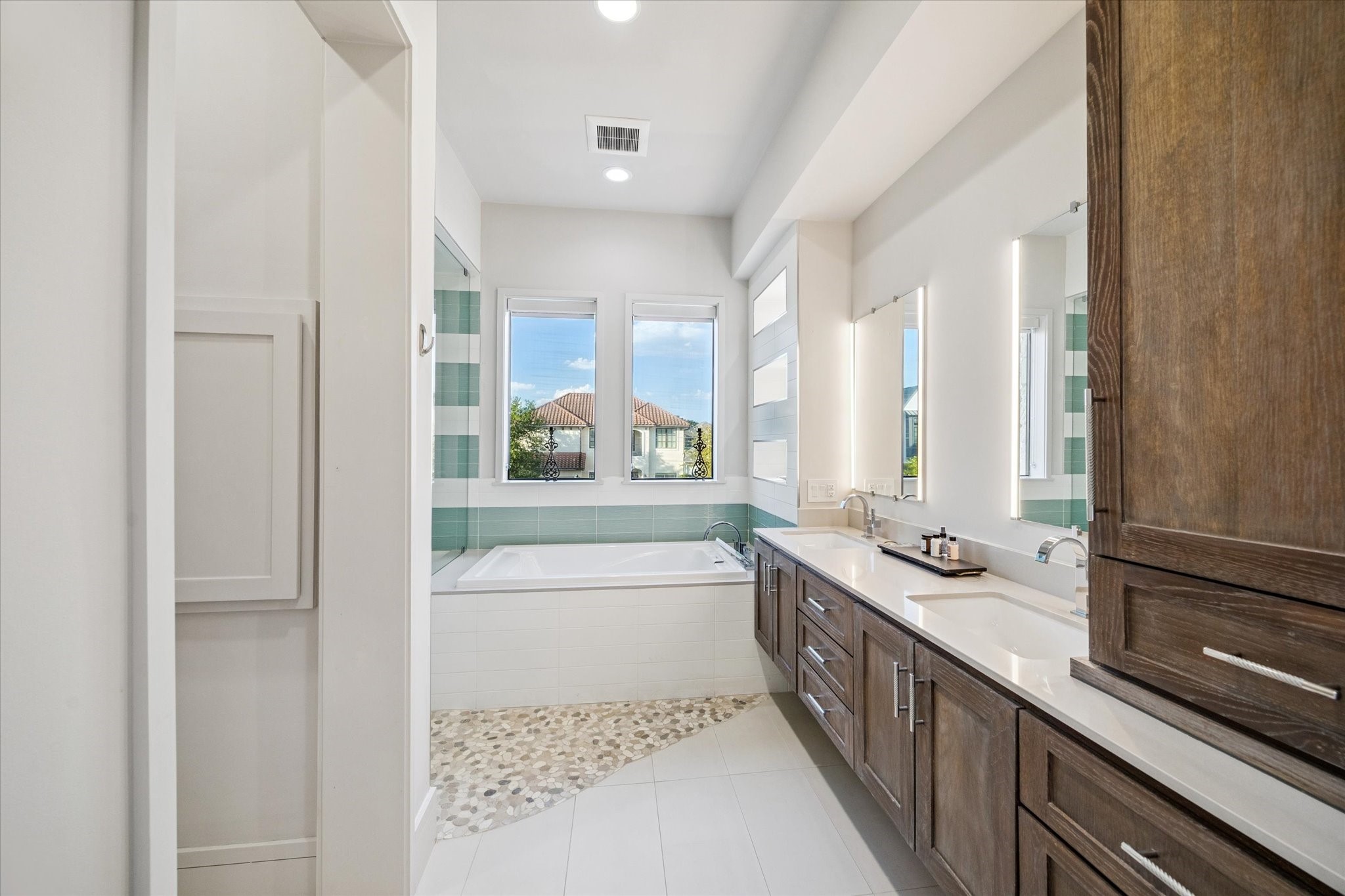 1249 Chippendale Road Houston, TX 77018 - Photo 25 of 45 Spa-inspired second primary bath with Moen shower control and beach entrance.