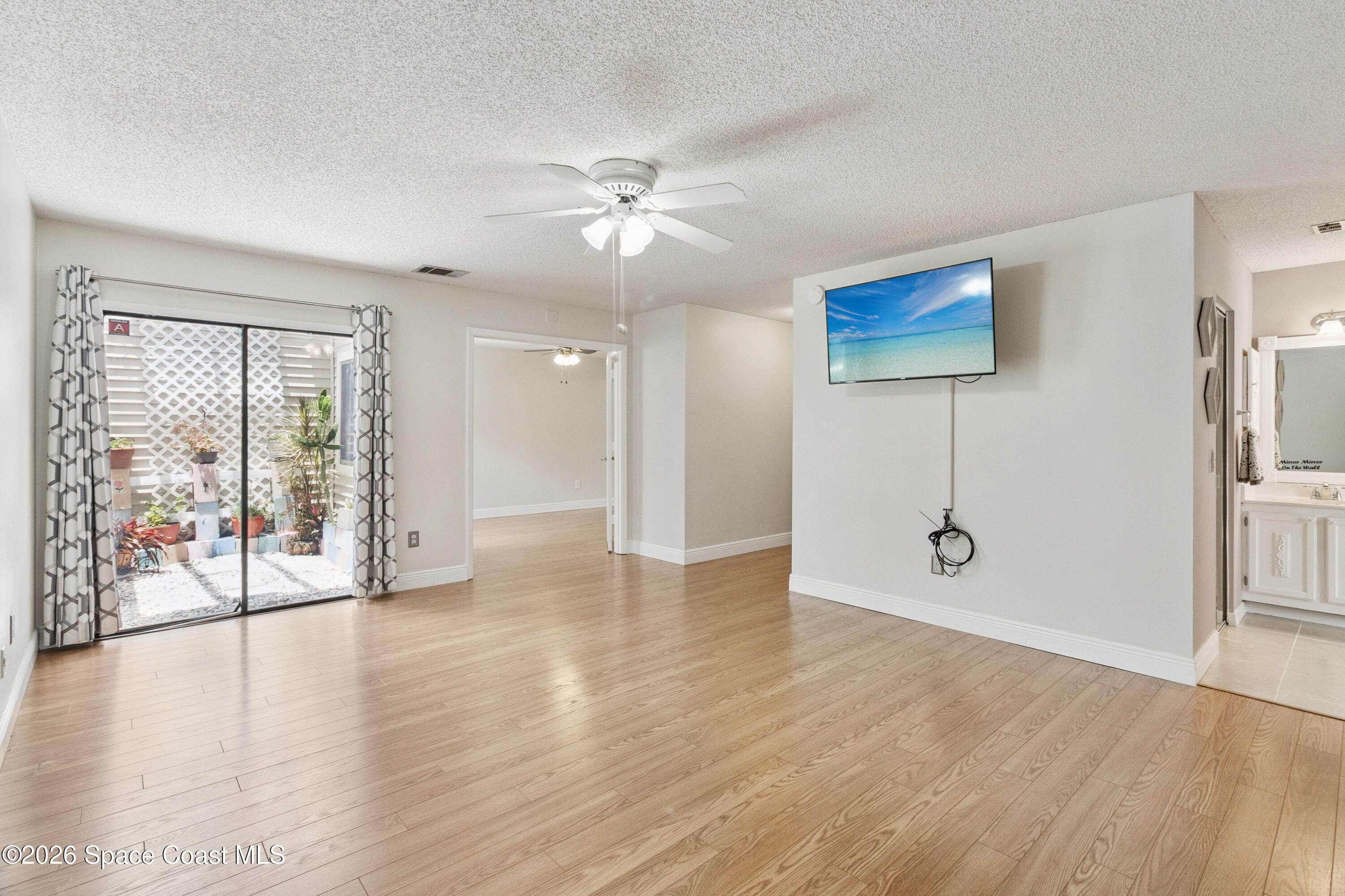 1334 Cherry Hills Road Northeast Palm Bay, FL 32905 - Photo 18 of 58 Master Bedroom