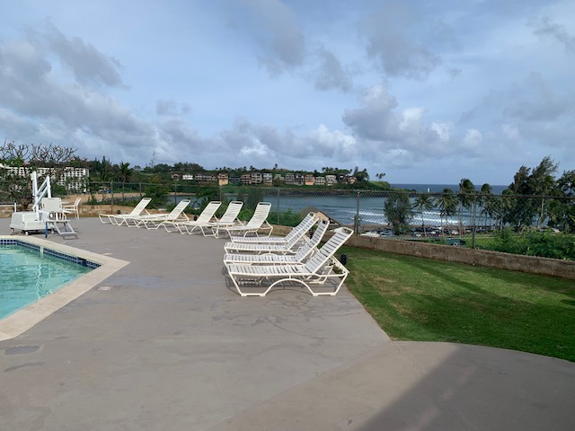 3411 Wilcox Road, Unit IIII109 Lihue, HI 96766 - Photo 12 of 12 an outdoor space with furniture and city view