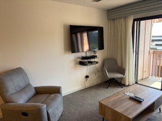 3411 Wilcox Road, Unit IIII109 Lihue, HI 96766 - Photo 3 of 12 a living room with furniture and a window