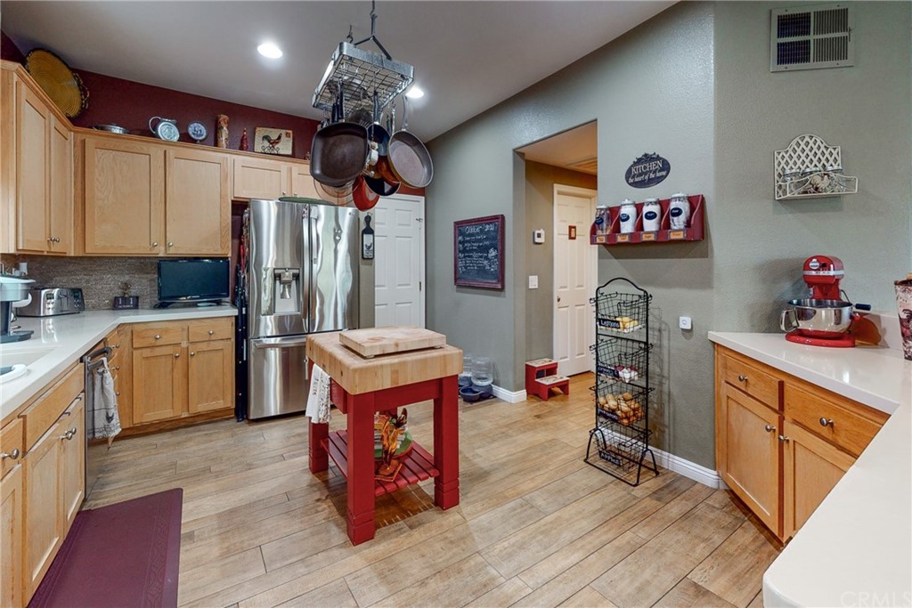 3199 Toopal Drive Oceanside, CA 92058 - Photo 13 of 47 a kitchen that has a lot of cabinets in it and appliances