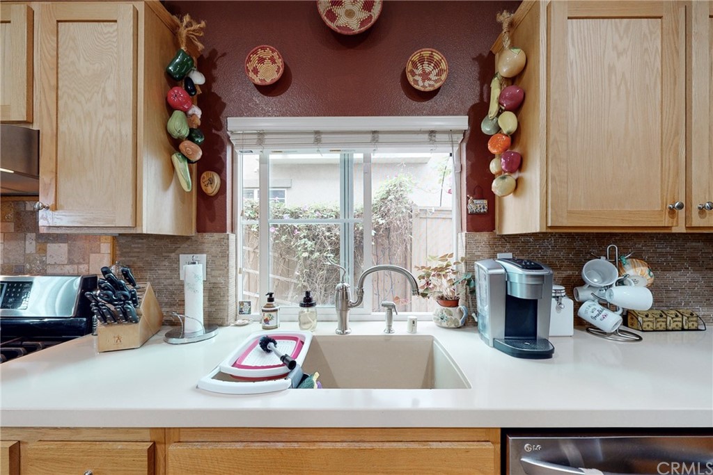 3199 Toopal Drive Oceanside, CA 92058 - Photo 15 of 47 a kitchen with a refrigerator and a stove