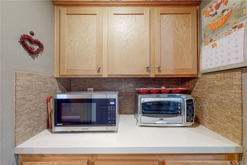 3199 Toopal Drive Oceanside, CA 92058 - Photo 17 of 47 a stove top oven sitting inside of a kitchen