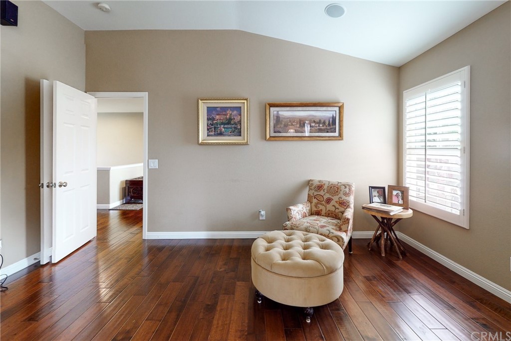 3199 Toopal Drive Oceanside, CA 92058 - Photo 27 of 47 a living room with furniture and a wooden floor