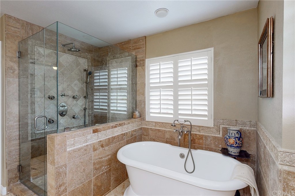 3199 Toopal Drive Oceanside, CA 92058 - Photo 30 of 47 a bathroom with a bathtub and a sink