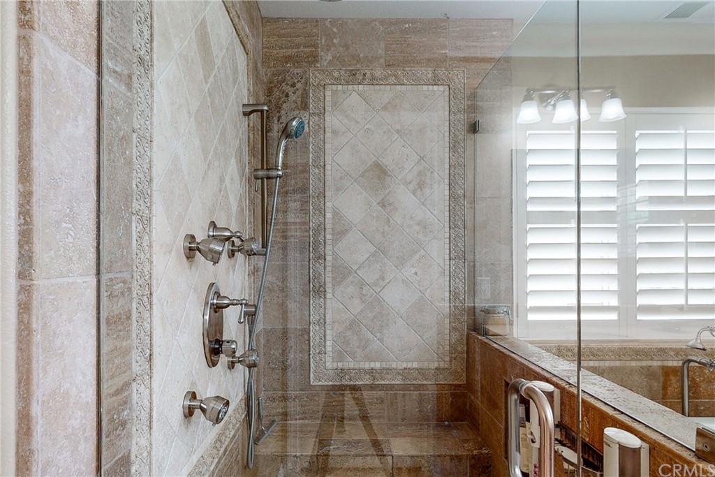 3199 Toopal Drive Oceanside, CA 92058 - Photo 32 of 47 a bathroom with a bathtub and shower