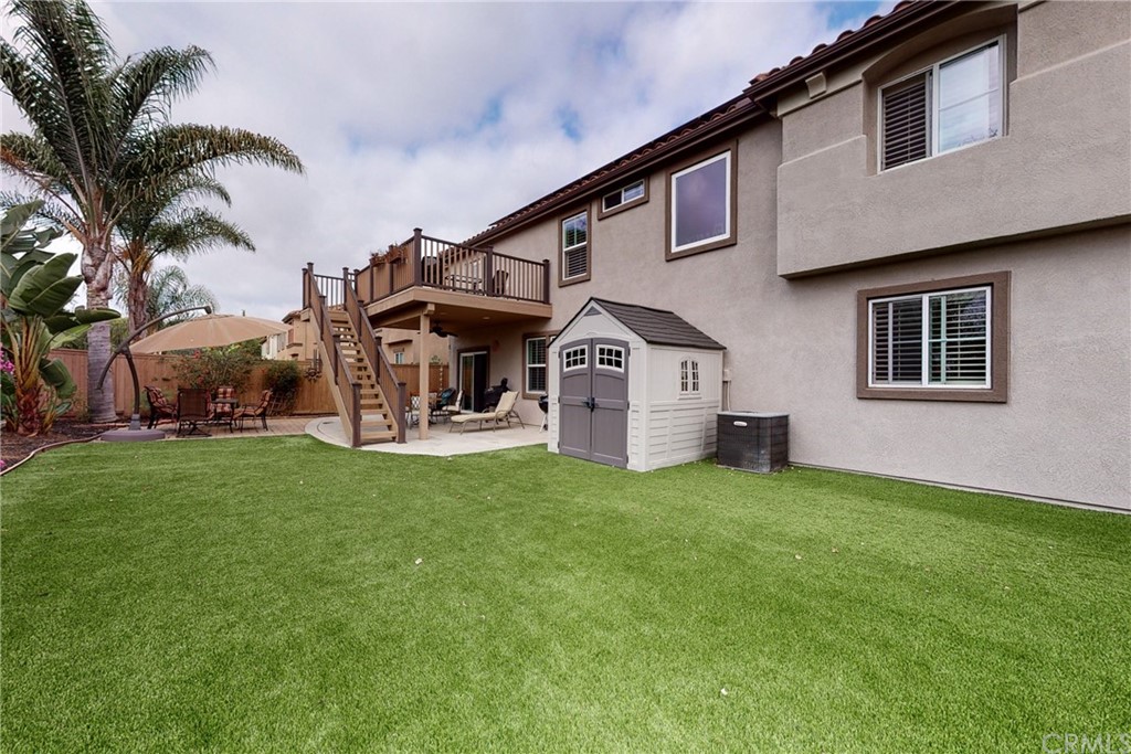 3199 Toopal Drive Oceanside, CA 92058 - Photo 38 of 47 a front view of a house with garden