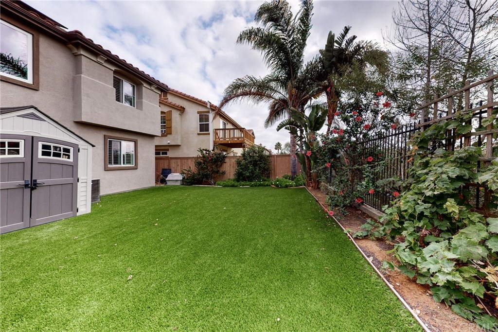 3199 Toopal Drive Oceanside, CA 92058 - Photo 45 of 47 a backyard of a house with lots of green space