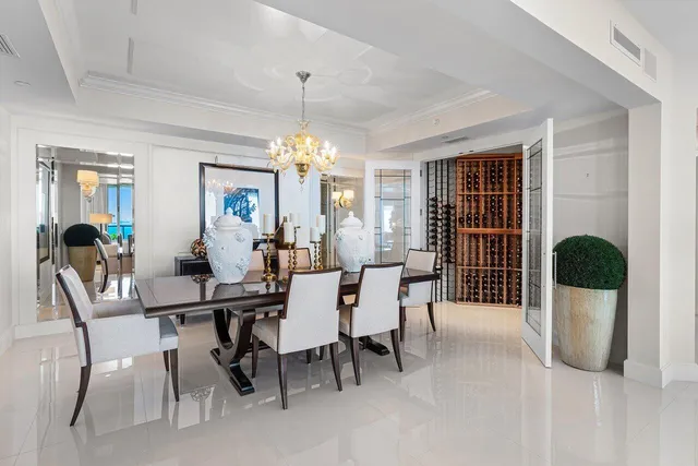 a bathroom with a bathtub sink and mirror