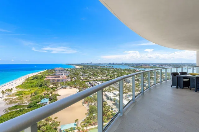 a kitchen with a sink and refrigerator