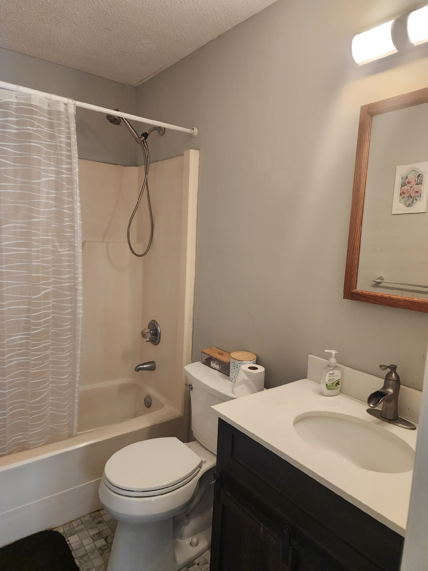 109 Marvin Drive Spring Lake, NC 28390 - Photo 11 of 13 a bathroom with a sink toilet and shower