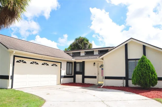 a view of a house with garage