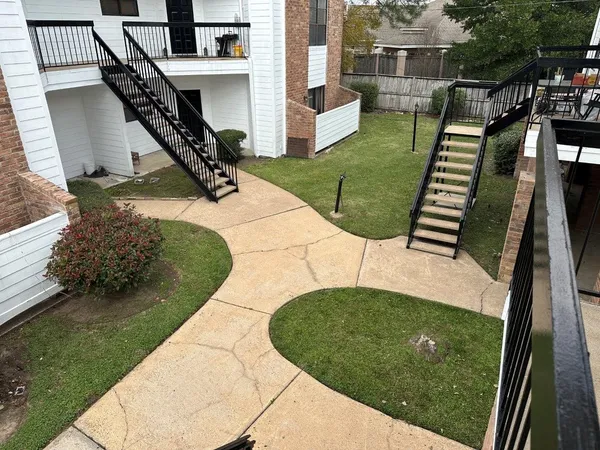 a view of a garden with a slide