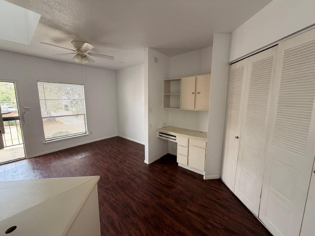 7901 Cambridge Street, Unit 133 Houston, TX 77054 - Photo 8 of 14 a kitchen with a refrigerator and a stove top oven