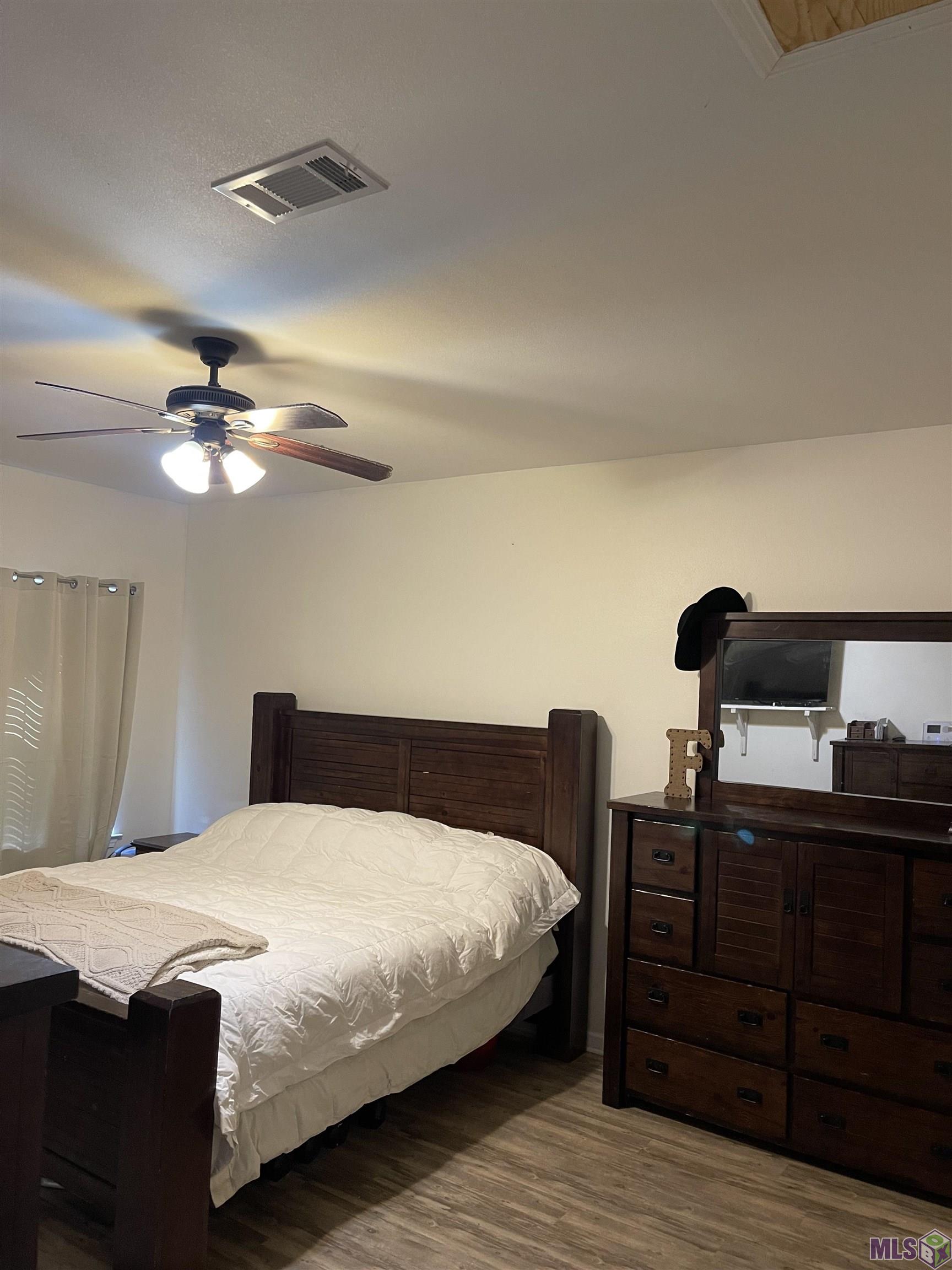 19639 Perrilloux Road Livingston, LA 70754 - Photo 10 of 14 Master Bedroom