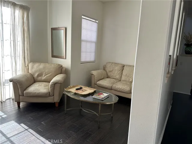 a kitchen with granite countertop a refrigerator stove and sink