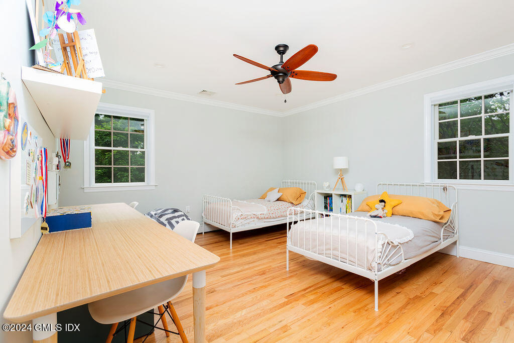 25 Griffith Road Riverside, CT 06878 - Photo 15 of 27 a bedroom with furniture and window