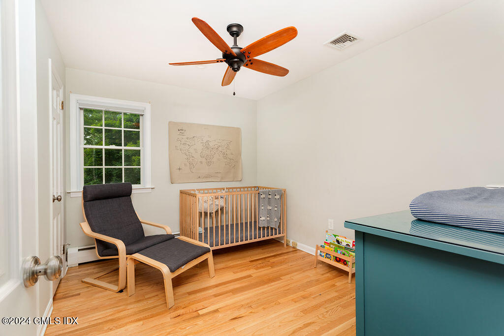 25 Griffith Road Riverside, CT 06878 - Photo 17 of 27 a room with furniture and windows