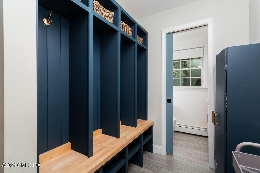 25 Griffith Road Riverside, CT 06878 - Photo 8 of 27 a view of hallway with furniture and a window