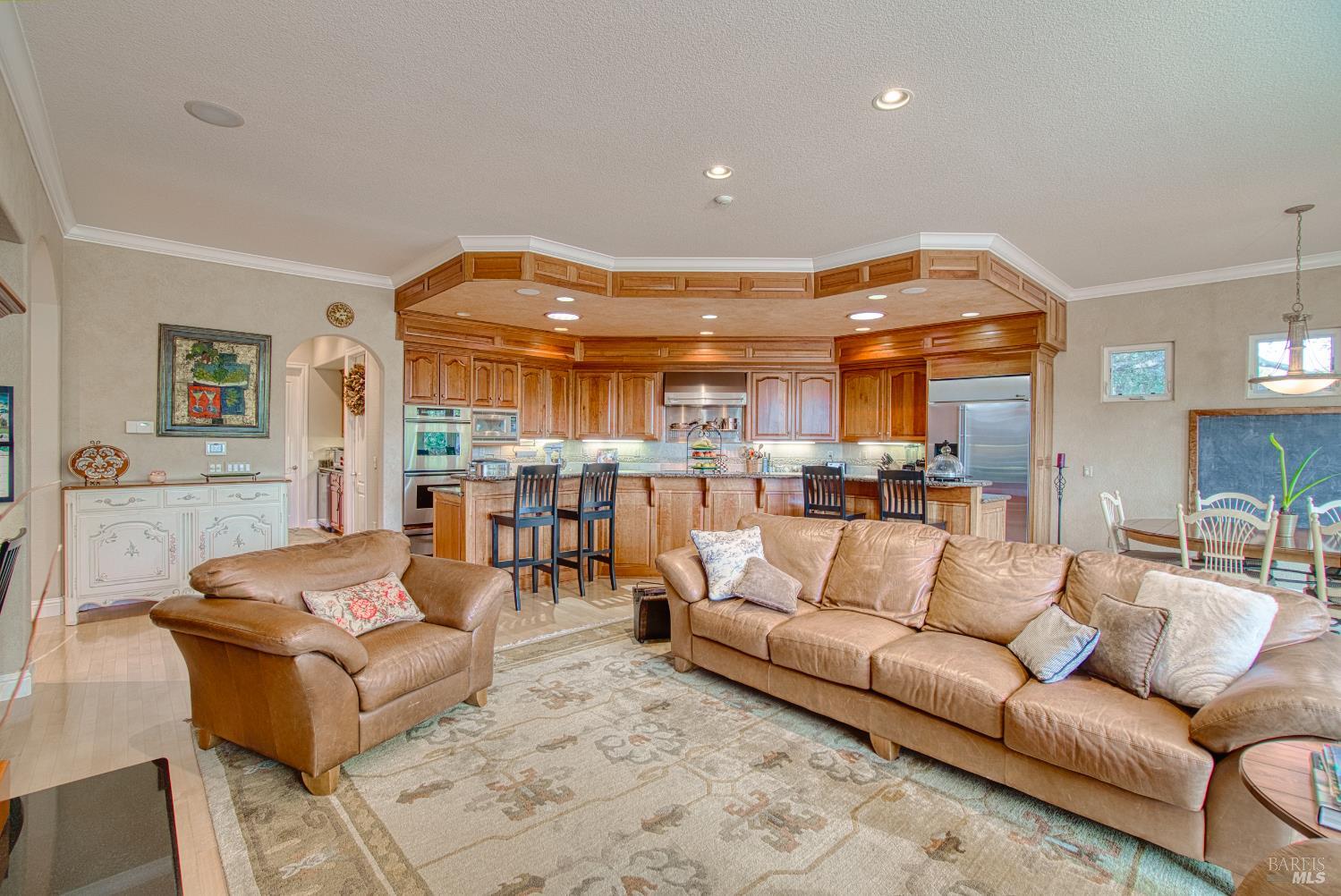 2703 Brush Creek Road Santa Rosa, CA 95404 - Photo 37 of 76 a living room with furniture and a view of kitchen