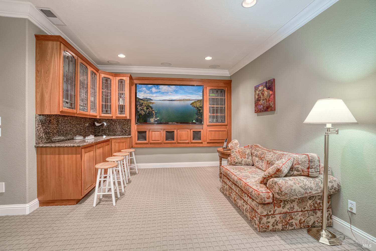 2703 Brush Creek Road Santa Rosa, CA 95404 - Photo 62 of 76 a living room with furniture and a flat screen tv