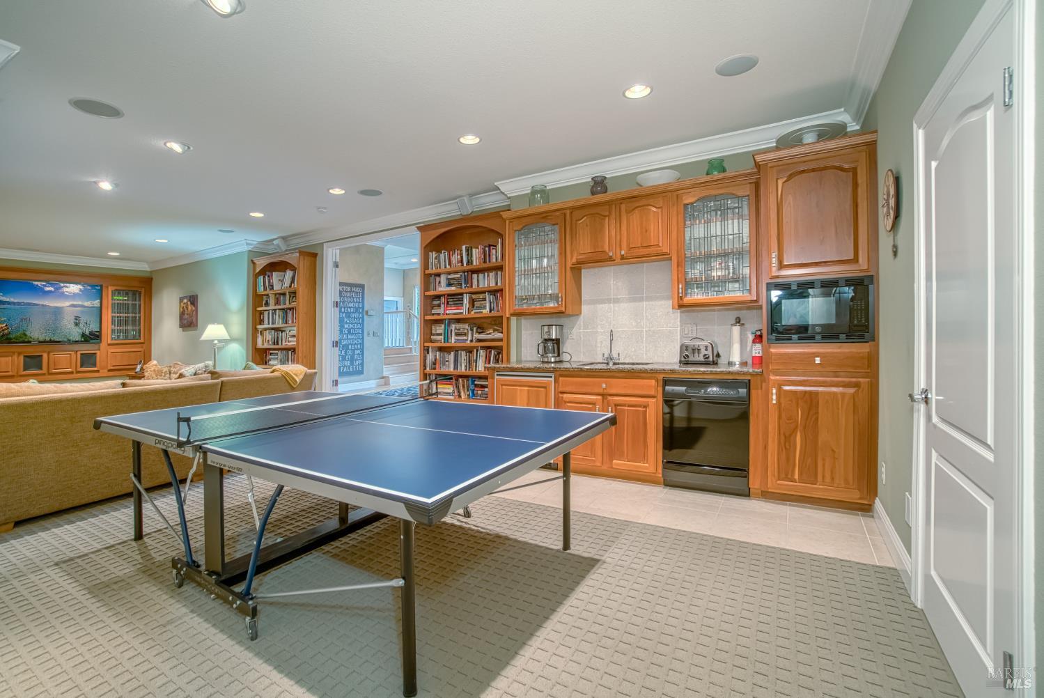 2703 Brush Creek Road Santa Rosa, CA 95404 - Photo 73 of 76 a kitchen with stainless steel appliances granite countertop a stove top oven a sink dishwasher and a refrigerator with wooden floor