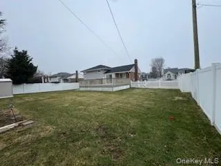 a house view with swimming pool in front of it