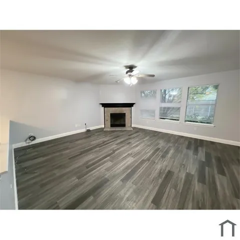 a black and white photo of a living room