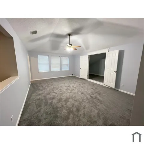 a open hall with a stove