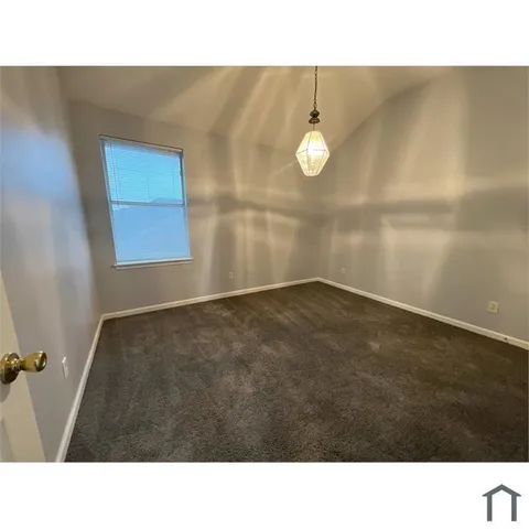 a open area with cabinets