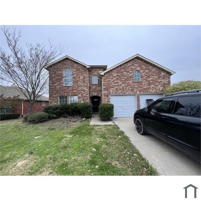 114 Galloping Trail Forney, TX 75126 - Photo 2 of 21 a front view of a house with a garden