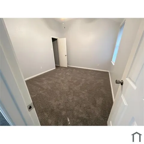 a black and white photo of a room