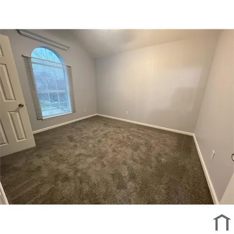 a black and white photo of a house