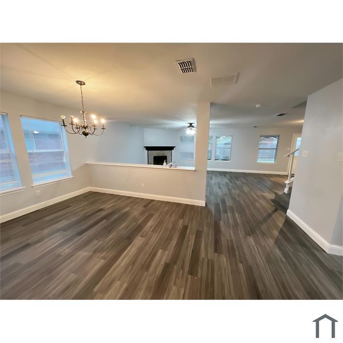 114 Galloping Trail Forney, TX 75126 - Photo 8 of 21 a bathroom with a sink a mirror and wooden floor