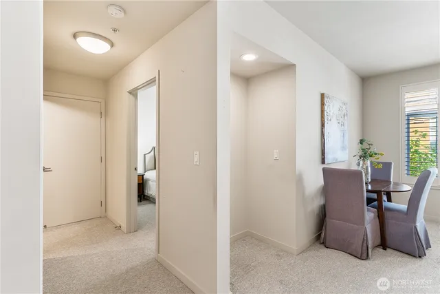 a view of a livingroom with furniture and windows
