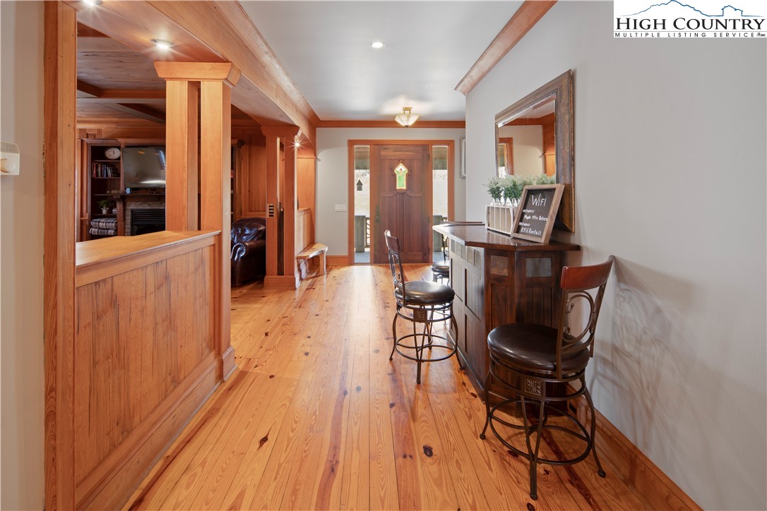 442 Aldridge Road Banner Elk, NC 28604 - Photo 13 of 50 a view of a dining room with furniture and wooden floor