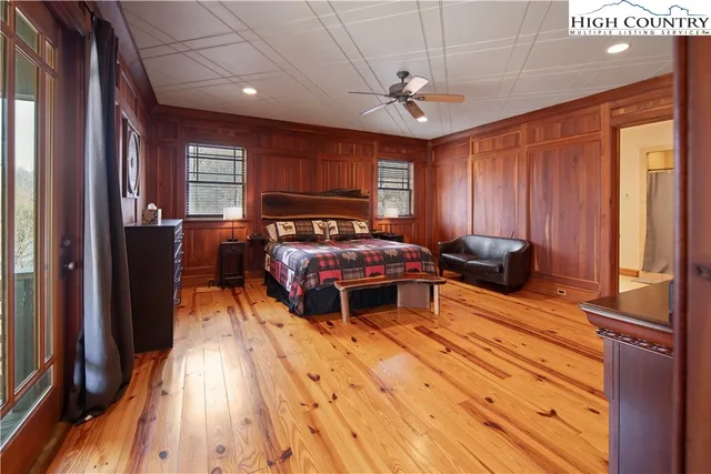 a view of a livingroom with furniture window and wooden floor