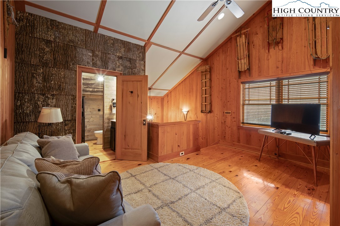 442 Aldridge Road Banner Elk, NC 28604 - Photo 19 of 50 a living room with furniture and a flat screen tv