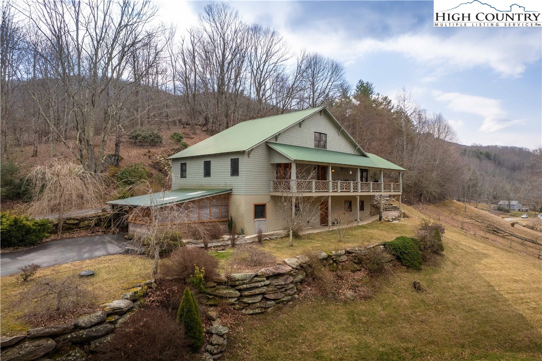 442 Aldridge Road Banner Elk, NC 28604 - Photo 39 of 50 a view of a house with a yard
