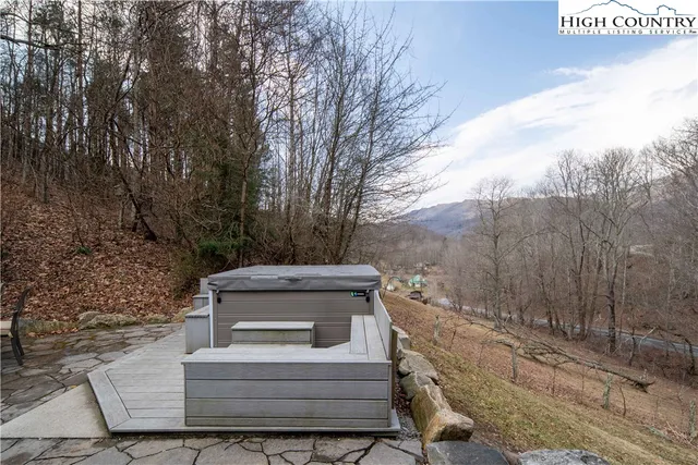 a view of house with trees in the background